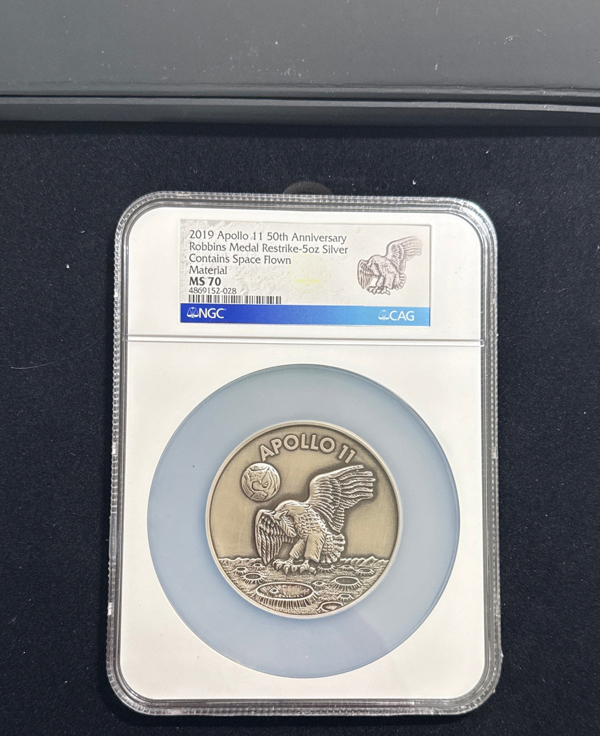 Vintage Vault: 2019 Apollo 11 50th Anniversary Robins Metal Restrike-5 oz Silver Contains Space Flown Material NGC MS70